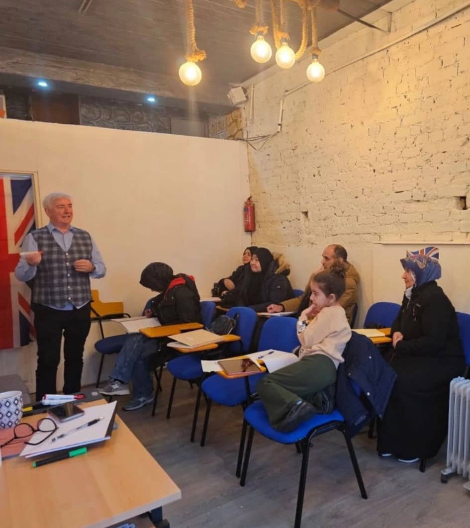 Steve Hoca explaining lessons to students