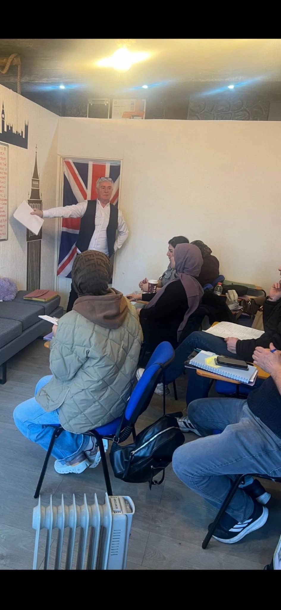 Steve Hoca explaining lessons to students